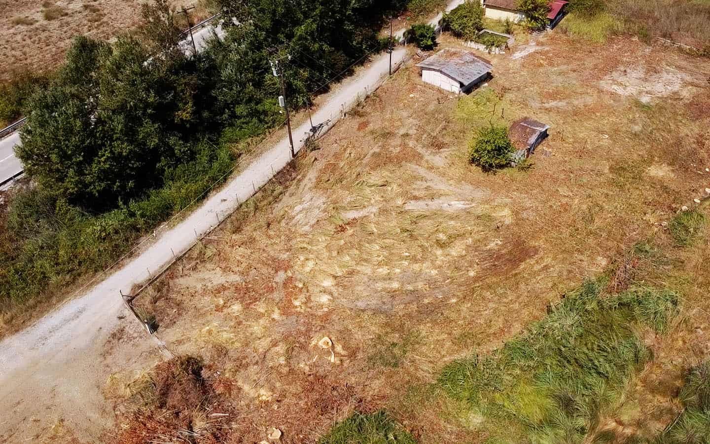 Προβατιδης μεσιτικά Γρίτσα θέα από ψιλά στο παραθαλάσσιο αγροτεμάχιο με δρόμο