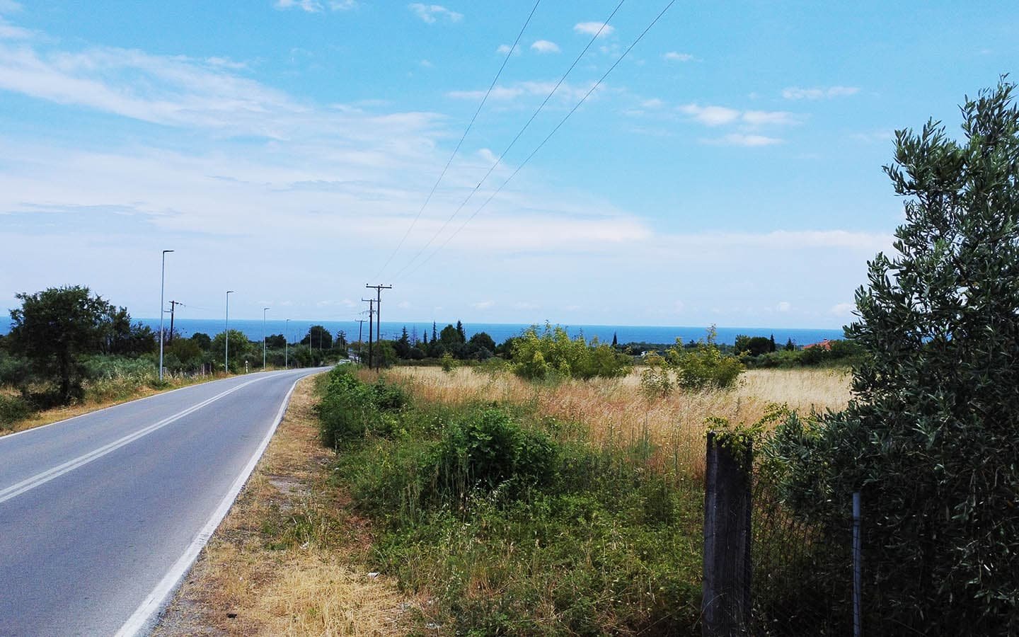 Προβατίδης μεσιτικά Πλάκα Λιτοχώρου δρόμος δίπλα στο αγροτεμάχιο με θέα στην θάλασσα