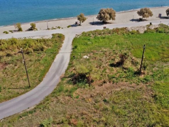Προβατίδης μεσιτικά Νέα Μεσάγκαλα παραθελάσσιο αγροτεμάχιο-θέα από ψιλά στο αγροτεμάχιο και θάλασσα