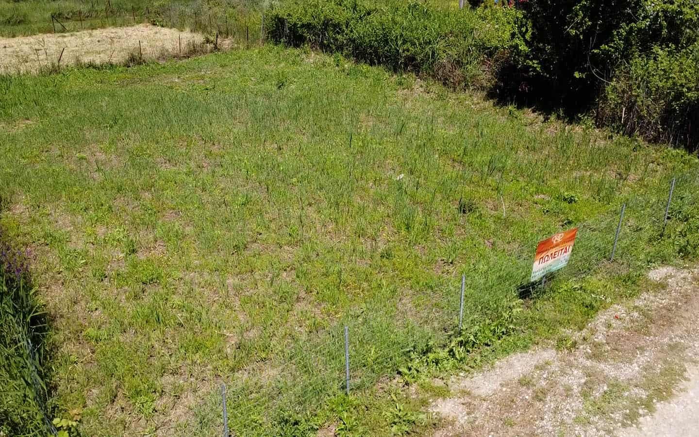 Provatidis μεσιτικά αγροτεμάχια-μεσιτικά Καστρί Λουτρό ματιά στο αγροτεμάχιο και πινακίδα