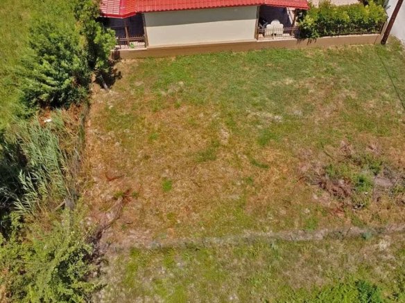 Provatidis real estate Καστρι Λουτρό οικοπέδο από πολύ ψηλά και από αριστερό πλάι