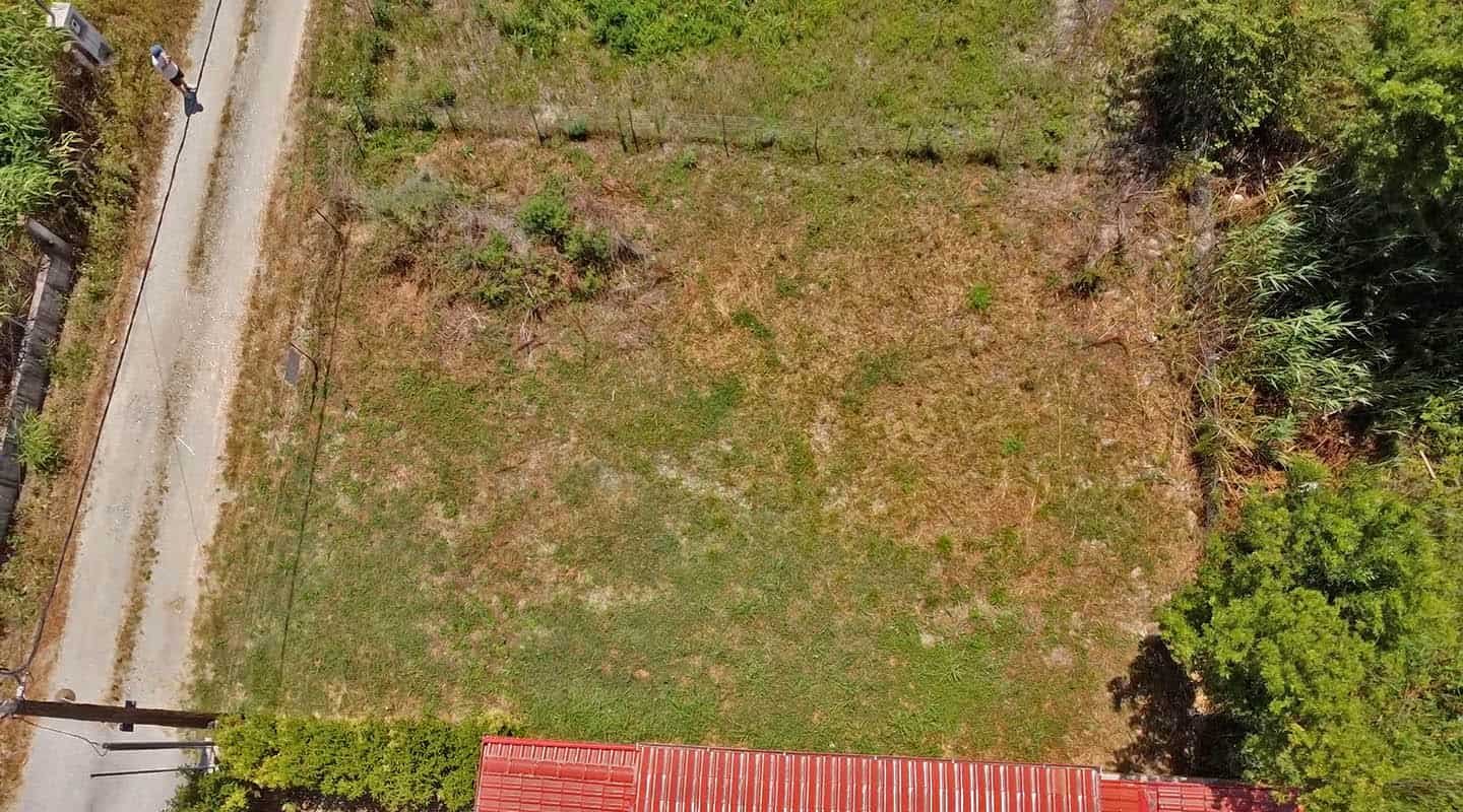 Provatidis real estate Καστρι Λουτρό θέα από πάνω στο αγροτεμάχιο από πλάι