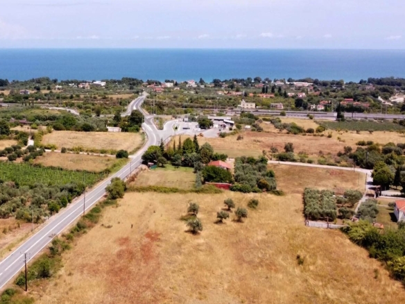 Προβατίδης μεσιτικά παραθαλάσσια οικόπεδα αγροτεμάχια-Οδός Κουτρουμπα και θέα από ψιλά προς ακίνητο και υπέροχη θάλασσα στο βάθος