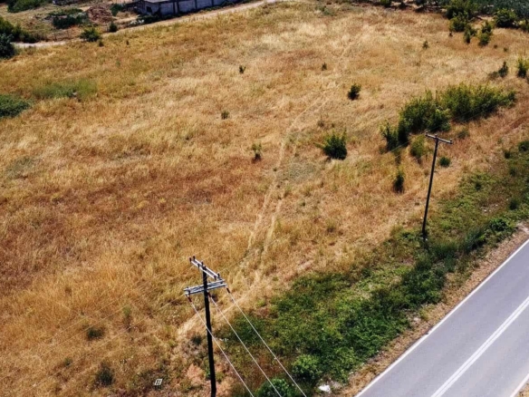 Προβατίδης μεσιτικά παραθαλάσσια οικόπεδα αγροτεμάχια-Οδός Κουτρουμπα και θέα από ψιλά προς ακίνητο και υπέροχη θάλασσα στο βάθος