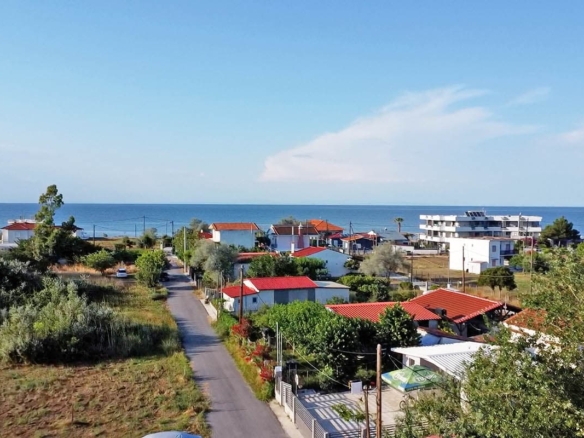 Προβατίδης μεσιτικά παραθαλάσσια ακίνητα,οικόπεδα, αγροτεμάχια, στην Μεσάγκαλα, Καστρί λουτρό, Πλάκα Λιτοχώρου, Σκοτίνα, Λεπτικαρυά και πώληση τροχοβιλών-ακίνητο, αγροτεμάχιο, οικόπεδο στην υπέροχη τοποθεσία. Λήψη από ψιλά στον δρόμο προς την θάλασσα και το ξενοδοχείο Golden Sun