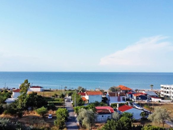 Προβατίδης μεσιτικά παραθαλάσσια ακίνητα,οικόπεδα, αγροτεμάχια, στην Μεσάγκαλα, Καστρί λουτρό, Πλάκα Λιτοχώρου, Σκοτίνα, Λεπτικαρυά και πώληση τροχοβιλών-υπέροχη σμαραγδένια θάλασσα με παραλία κοντα στο αγροτεμάχιο-οικόπεδο ευκαιρία με φαρδιές αμμουδιές, θέα στο ξενοδοχείοmGolden Sun